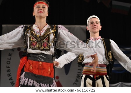 WARSAW - AUGUST 19: The National Folklore Ensemble from Albania - performs folk dances during the International Folklore Festival \