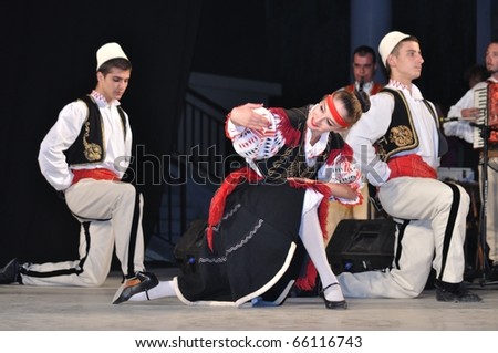 WARSAW - AUGUST 19: The National Folklore Ensemble from Albania - performs folk dances during the International Folklore Festival \