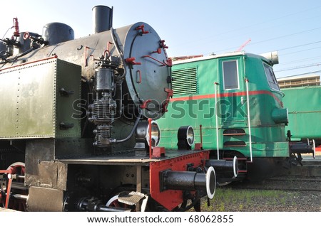 old steam locomotive and electric locomotive