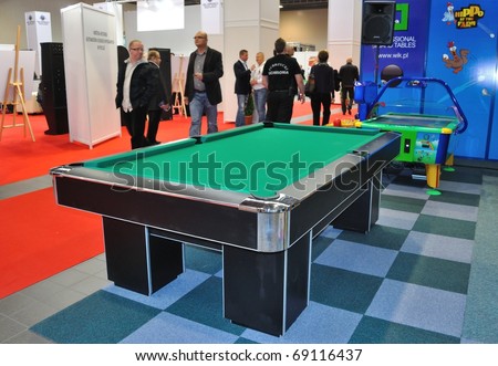 WARSAW - OCTOBER 14: pool table at exhibition stands of the SUREXPO 2010 - Salon of Entertainment Devices on October 14, 2010 in Warsaw, Poland.