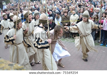 GORA KALWARIA - APRIL 17: Actors reenact scene of Jesus brought to Pilate by the Sanhedrin, during the street performances Mystery of the Passion on April 17, 2011 in Gora Kalwaria, Poland.