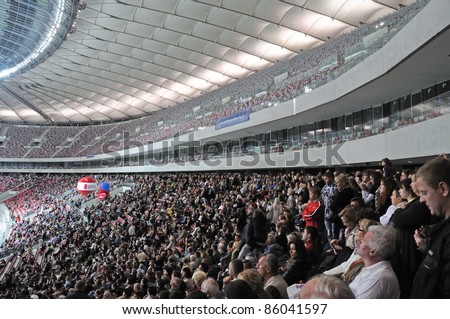 WARSAW - OCTOBER 02: Visitors at the grandstand, during The Grand Open Day at the National Stadium on October 02, 2011 in Warsaw, Poland.