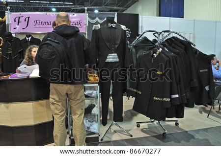 WARSAW - NOVEMBER 20: Trade fair stand of uniforms for the funeral service at the exhibition of funeral industry \