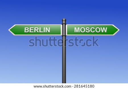 Signpost with arrows pointing two directions - towards Berlin and Moscow.