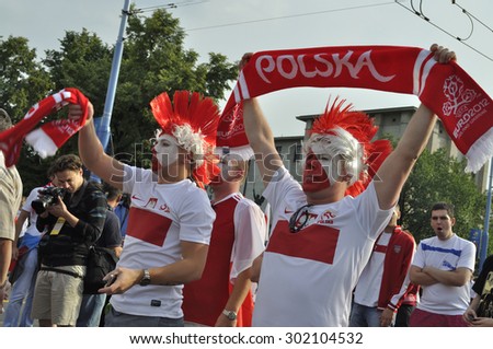WARSAW, POLAND - JUNE 12, 2012 - Poland fans at the Warsaw street during the UEFA EURO 2012 Group A match against Russia.