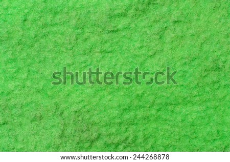Green  fabric texture of wool .  Craft background