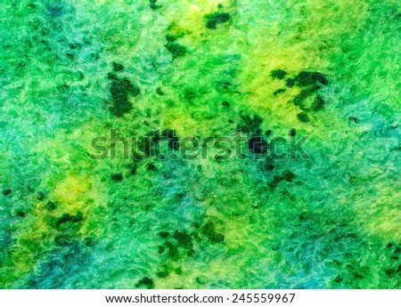 Multicolor abstract fabric texture of wool with stains  .  Craft background