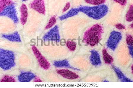 Multicolor  mosaic fabric texture of wool .  Craft background