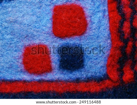 Multicolored square fabric texture of wool.  Craft background