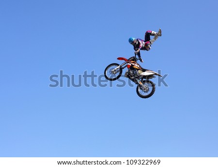 MOSCOW, RUSSIA - JULY 28 : Luzhniki, Massimo Bianconcini performs motorcycle stunt trick at Freestyle Motocross session during Moscow City Games on July 28, 2012 in Moscow.