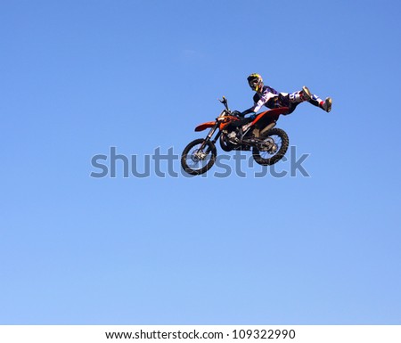 MOSCOW, RUSSIA - JULY 28 : Luzhniki, Alexey Aysin performs motorcycle stunt trick at Freestyle Motocross session during Moscow City Games on July 28, 2012 in Moscow.
