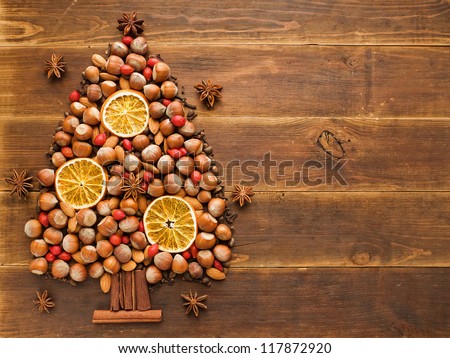 Christmas Tree Made Of Nuts, Spices And Dried Oranges. Viewed From Above.