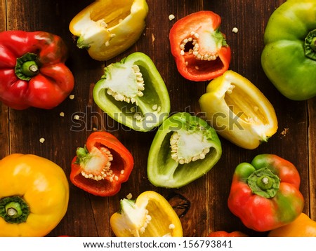 Group Of Colorful Peppers On The Wooden Background. Viewed From Above.