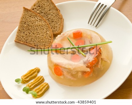 Plate with ukrainian traditional meat aspic. Shallow dof.