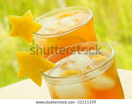 Glasses with fresh ice tea and lemon. Shallow dof.