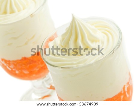 Sweet carrot dessert with whipped cream. Shallow dof.
