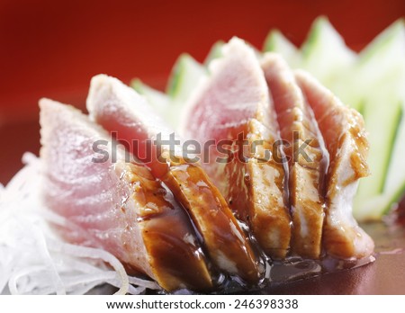 RAW TUNA FISH SUSHI - A sushi dish of raw tuna and soy sauce