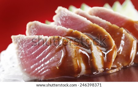 RAW TUNA FISH SUSHI 2 - A sushi dish of raw tuna and soy sauce