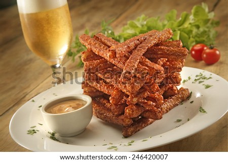 FRIED CHEESE - A shot of fried cheese sticks with salad and dipping sauce
