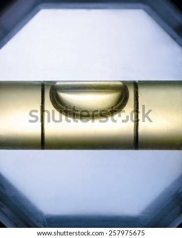 A close up of a spirit level bubble