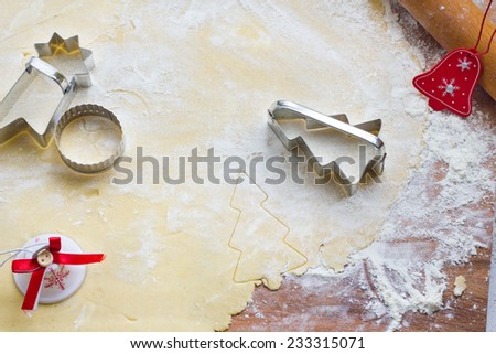 Baking christmas cookies on pastry board