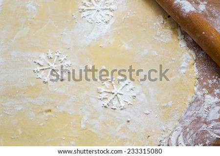 Baking cookies for christmas on pastry board