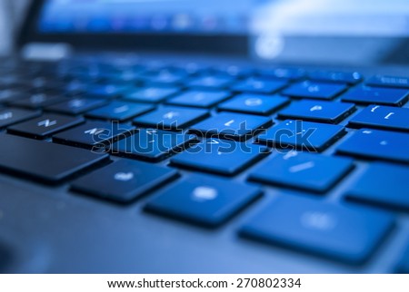 black illuminated laptop keyboard