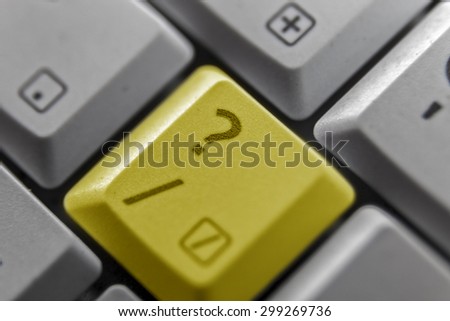 Showing a question mark button on a computer keyboard