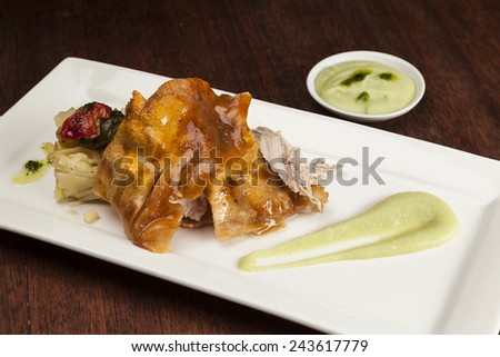 Roast pork with potatoes and apple sauce