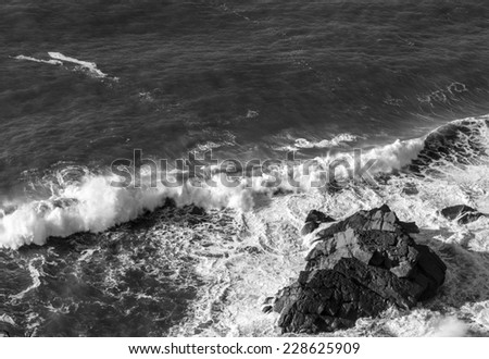 Black & White Atlantic Ocean wave break over rocks