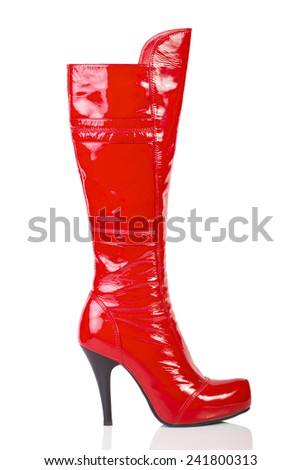 Women red high-heeled boots isolated on white background