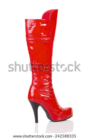 Women red high-heeled boots isolated on white background