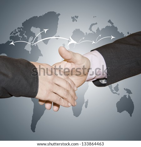 greeting business people with world map background