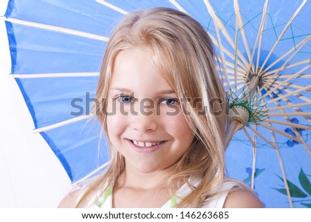 smiling girl with white umbrella