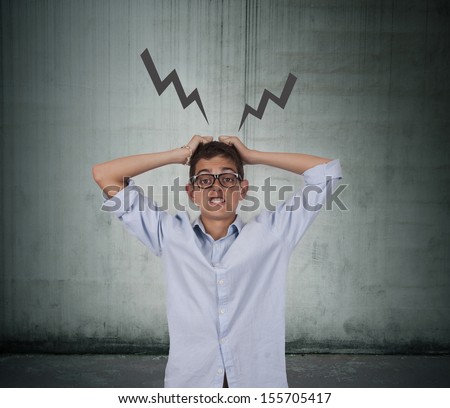 desperate man with hands in hair