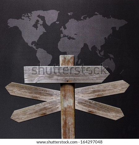 sign with world map with many directions to travel