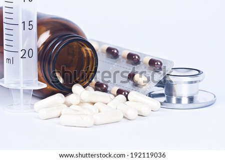 tablets and medicines with hospital objects, lifestyle