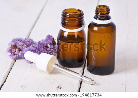 bottles of massage oil and aromatherapy spa