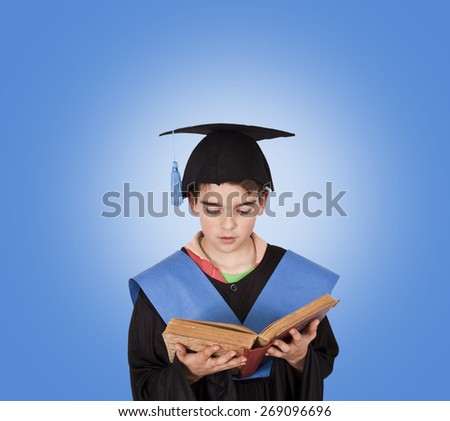 child with graduation robe