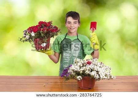 child with garden plants isolated on white