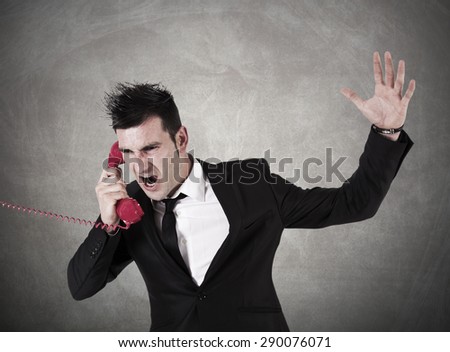 man screaming on the phone