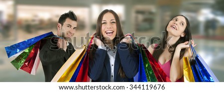 group of people shopping in shopping center