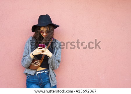 girl with smartphone on street