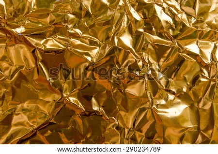 Gold creased paper background texture