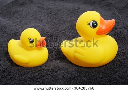 rubber duckies on a towel