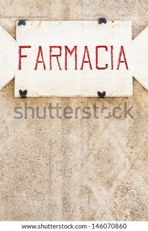 Penza, Tuscany region - Italy. An old pharmacy sign made of stone