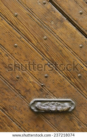 Wooden door and knob.