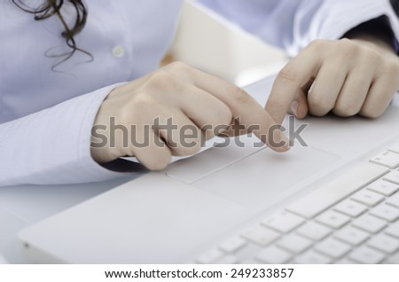 Computer and hands.