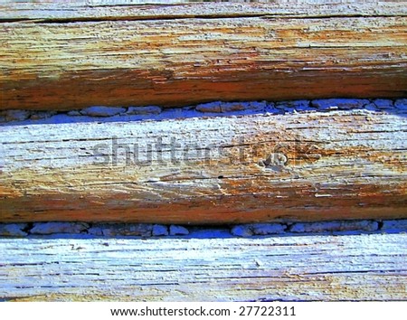 Fragment of old country colorless wooden house wall