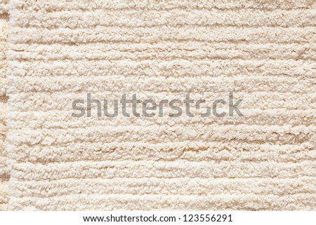 background of the carpet from the sheep wool at the fair